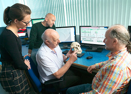 Ron Clarke displaying replica of fossil skull �C Left to right �C Am��lie Beaudet, Dominic Stratford, Ron Clarke and Robert Atwood